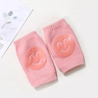 Cozy knee pads in various colors designed to protect babies during crawling with a non-slip, stretchy fit
