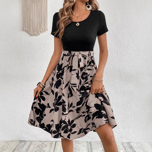 Women's khaki dress with plant printing, A-line skirt, adjustable shoulder straps, and lace-up detail