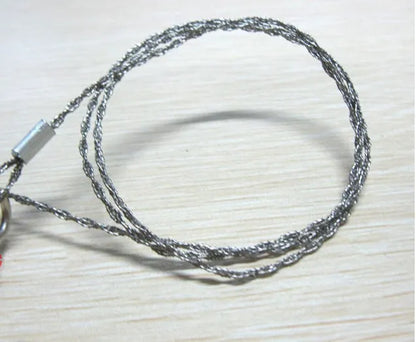 Outdoor survival wire saw with stainless steel blade and pull ring handles for camping and bushcraft