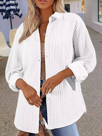 Women's solid colour cardigan sweater in black, shown open as a long-sleeved layer.