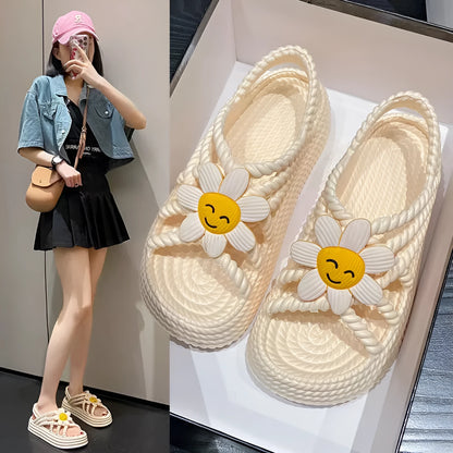 Women's beige PVC sandals with a sunflower pattern and round toe on a non-slip sole.