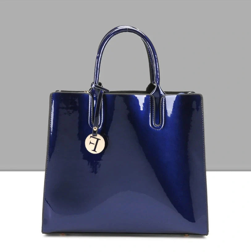 Versatile patent leather shoulder and crossbody handbags in a variety of classic and contemporary colors
