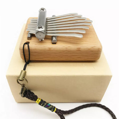 8-note mini thumb piano in beech wood, compact and portable musical instrument
