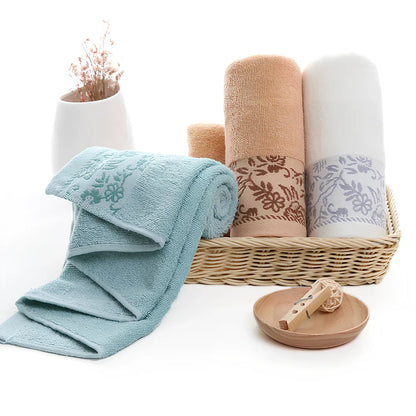 Wisteria flower jacquard cotton towel showing textured surface and 34x73 cm dimensions