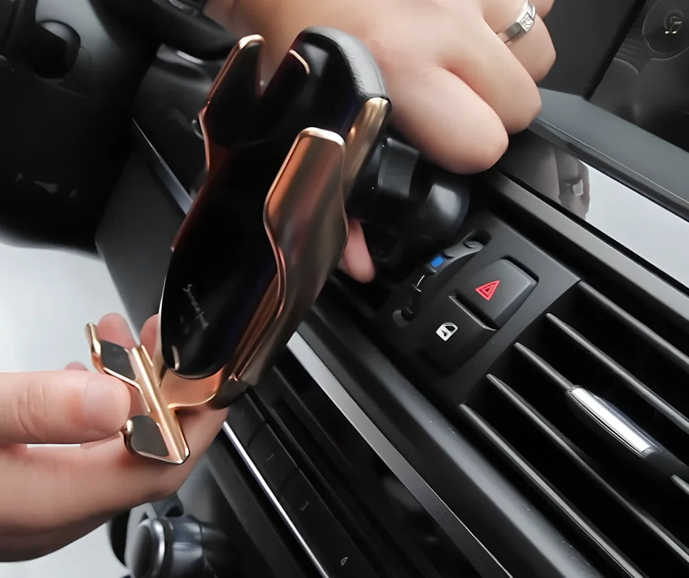 Black car wireless charger phone holder with suction cup mount and 360-degree rotation on a dashboard