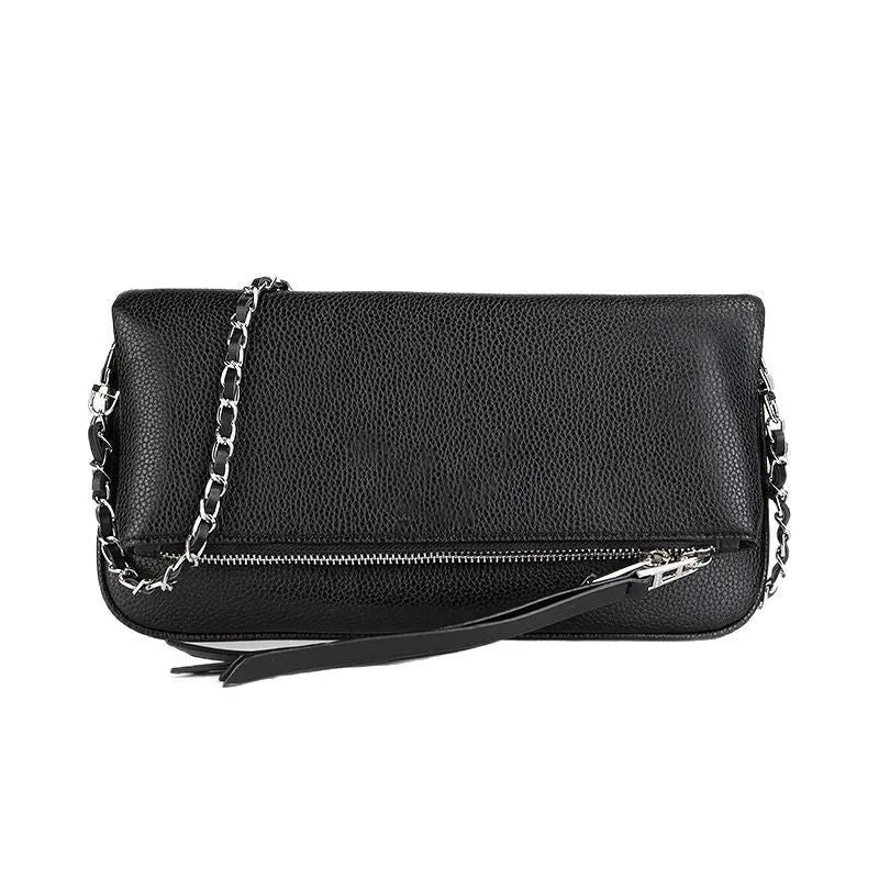 Soft black PU leather women's clutch bag with a gold chain strap, shown held and worn cross-body.