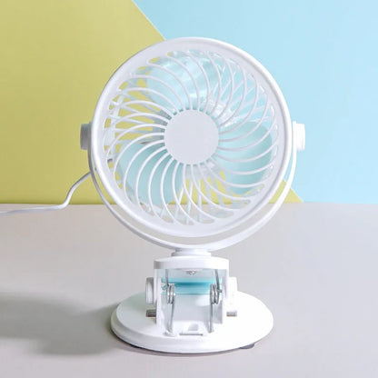 USB-powered desk fan with clip attachment, three blades, and mechanical speed control, measuring 19cm wide