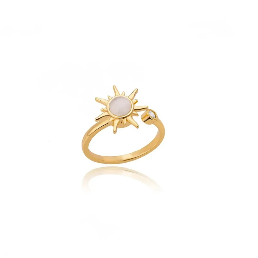 Adjustable rotatable decompression ring in gold or platinum electroplated copper