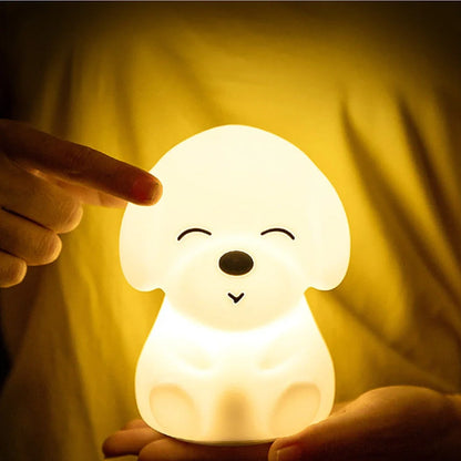 White silicone dog shaped table lamp with touch sensitive nose and colourful LED illumination