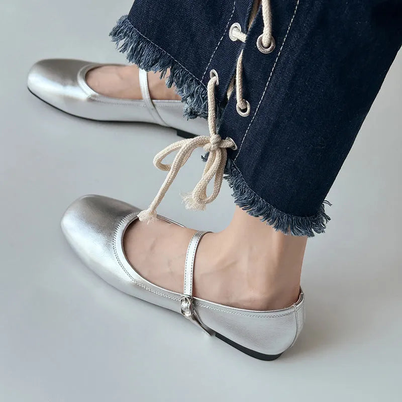 Women's brown sheepskin Mary Jane flat shoes with a round toe and strap