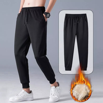 Men and women's black fleece drawstring pants for autumn and winter wear