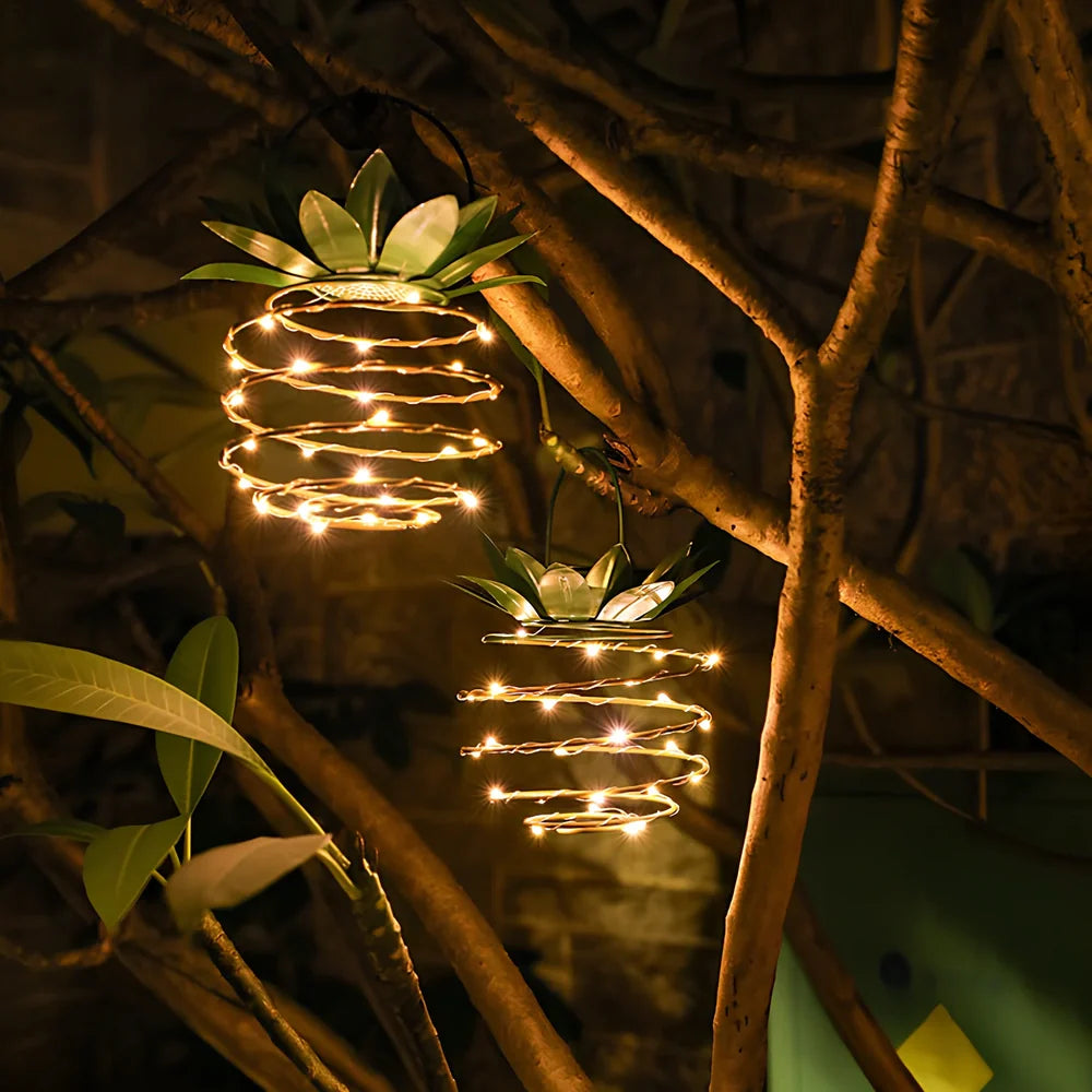 Pineapple-shaped solar garden light with LED illumination and waterproof housing for outdoor use