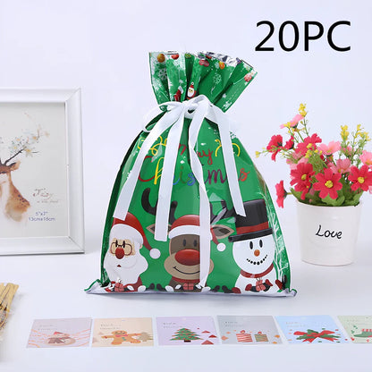 Christmas gift bag with drawstring closure in laser gold finish, 32x24cm dimensions