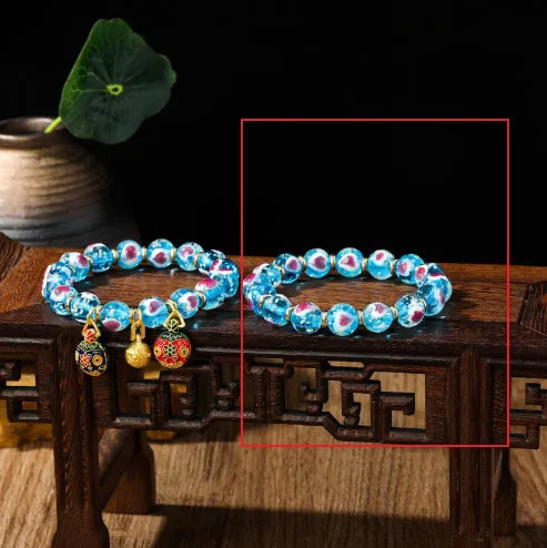 Handmade glass bracelet with 10mm swallowing gold beast cherry blossom heart charm in six colour options