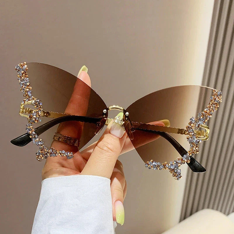 Luxurious diamond-studded butterfly sunglasses with oversized frames and a variety of color options
