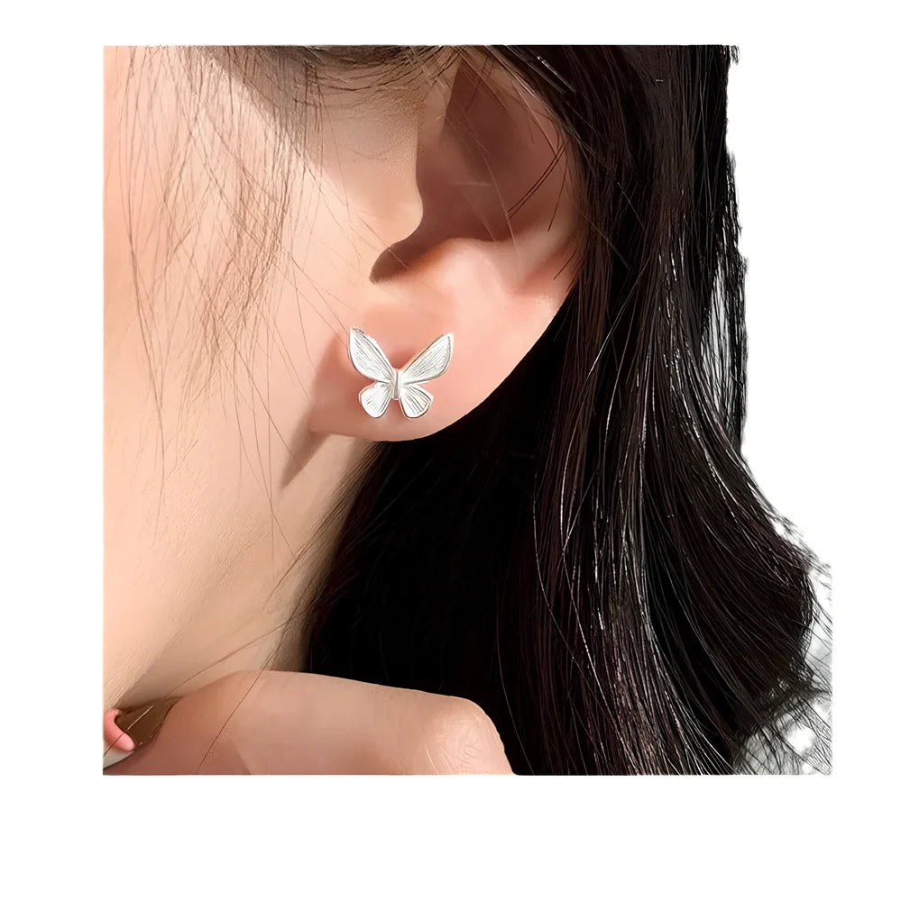 Sweet tridimensional butterfly stud earrings with textured design and electroplated finish