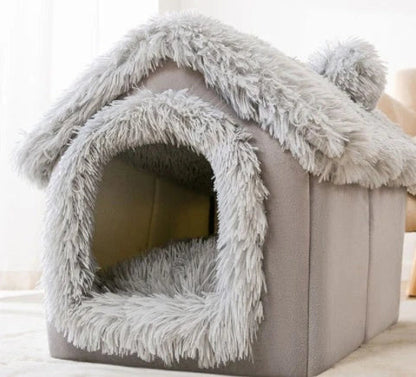 A cozy and comfortable pet bed with a self-warming fabric, durable non-slip base, and removable machine-washable cover
