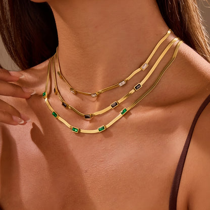 Retro geometric square zircon necklace with stainless steel construction and 18K gold plating on flat snake chain