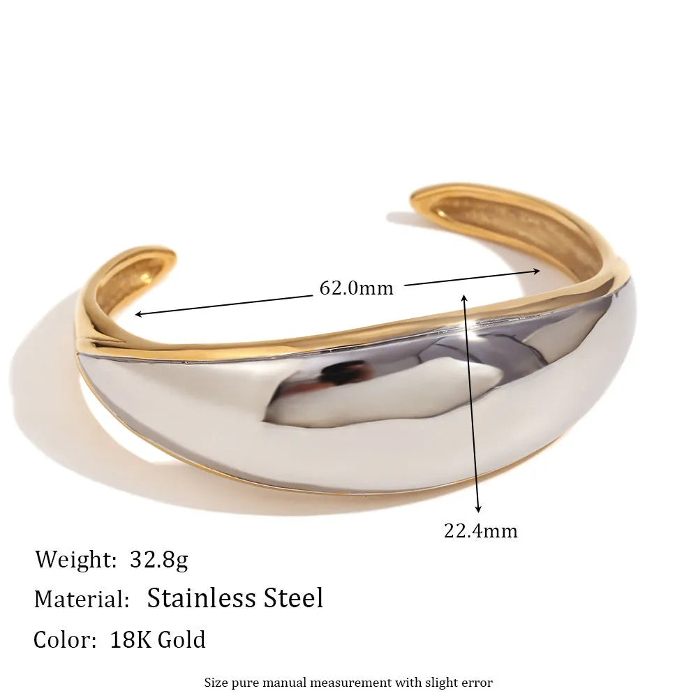 Gold electroplated stainless steel earrings, necklace, and bracelet set with geometric shapes and round ring elements