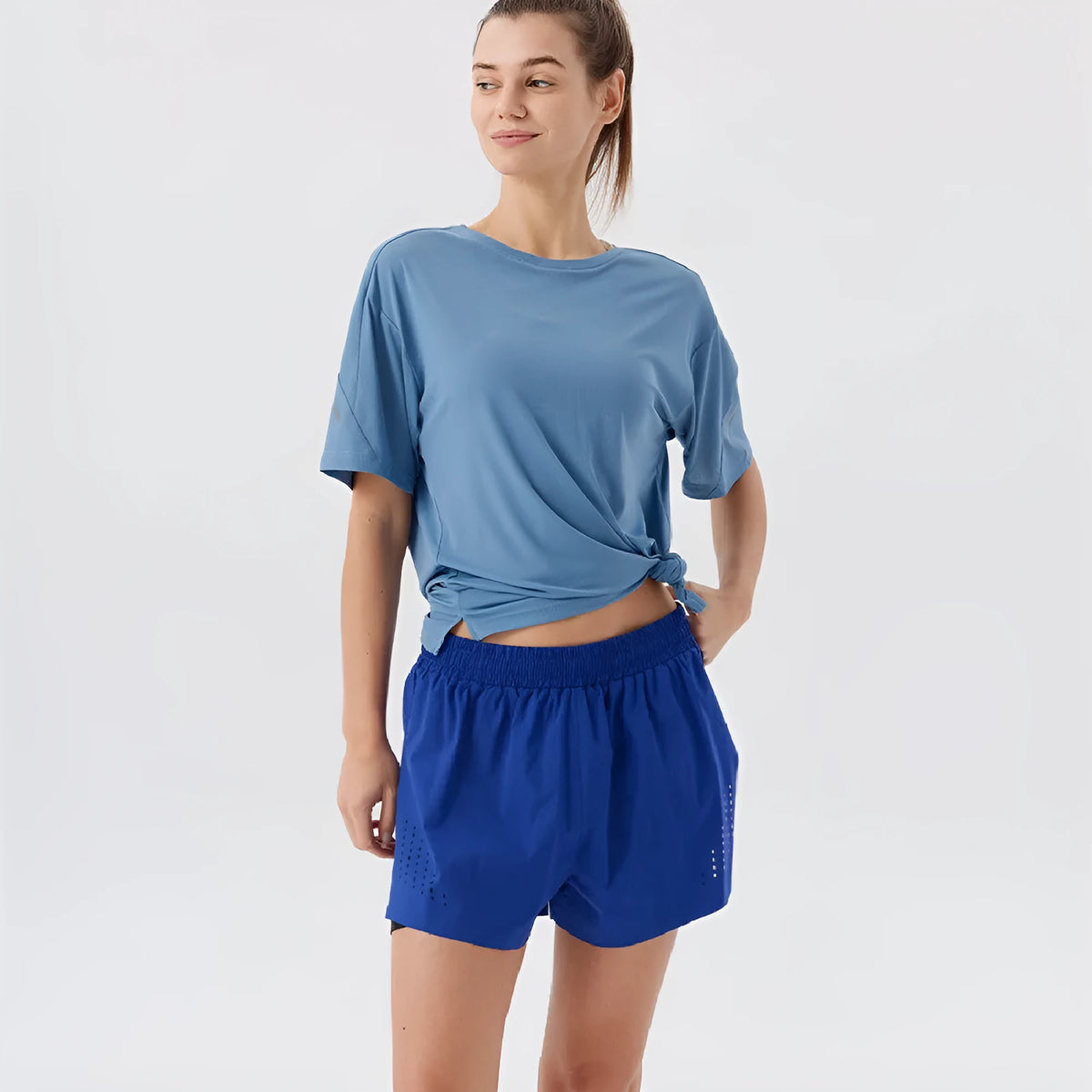 Men's straight-leg sports shorts with side slits in turmeric yellow, night blue, and black colours