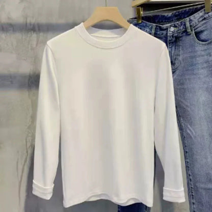 Men's black and white striped sweater in silk and linen blend showing temperature-regulating fabric texture
