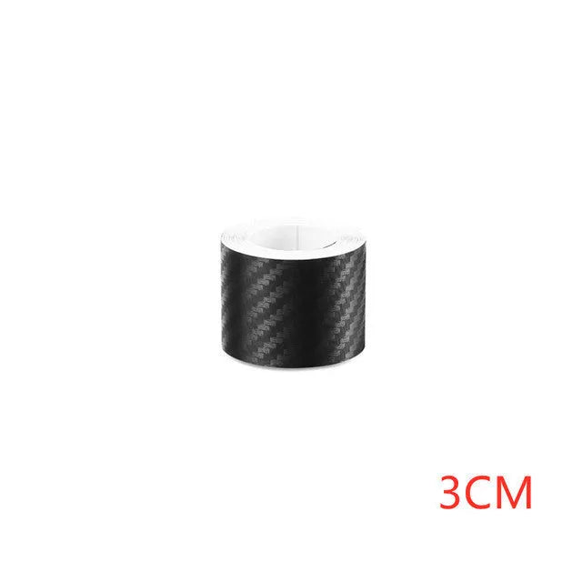 Black PET car door threshold sticker roll in 3D carbon fibre style, 3cm to 10cm wide and 1m to 5m long.