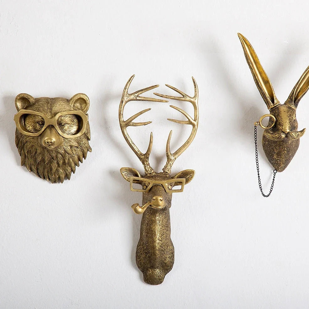 Antique bronze animal pendant showing bear design with synthetic resin construction