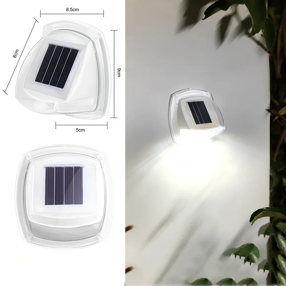Solar garden wall lamp with waterproof housing mounted on brick wall