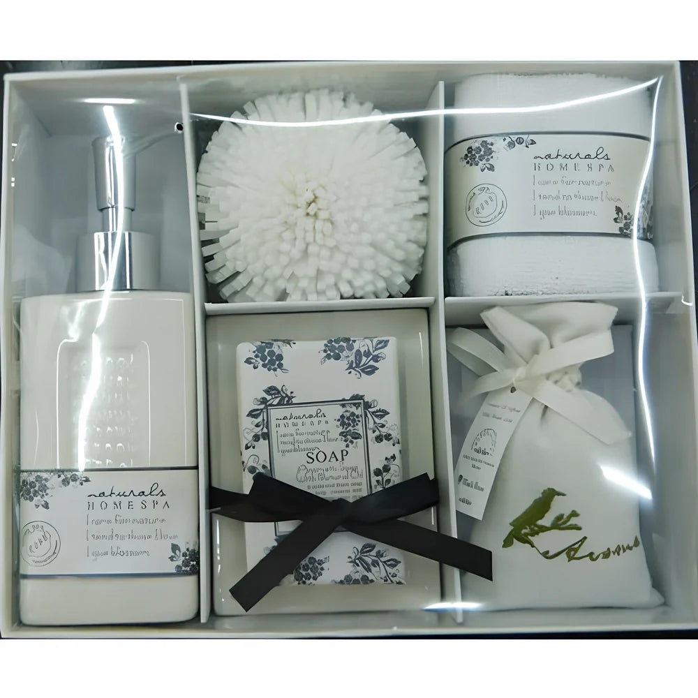 Five-piece ceramic bathroom set with soap dish, toothbrush holder, tumbler, and tissue box cover in coordinated design