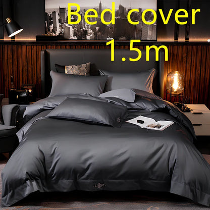 Four-piece quilted cotton bed set in royal blue, showing 200x230 cm cover and 48x74 cm pillowcases for 1.5m bed