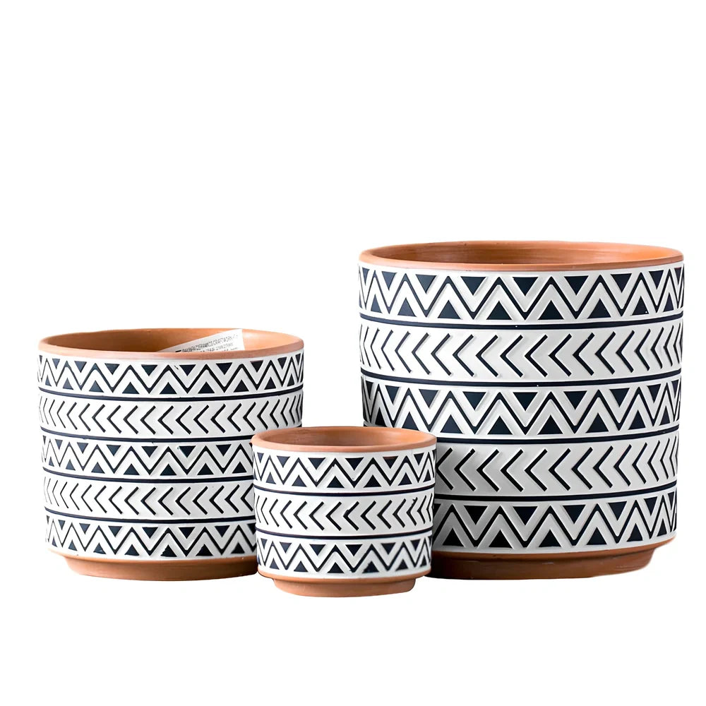 White ceramic geometric flower pot with Nordic design in three sizes for indoor plants