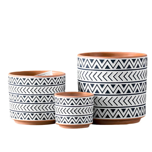 White ceramic geometric flower pot with Nordic design in three sizes for indoor plants