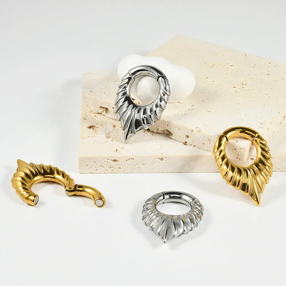 Drop-shaped stainless steel ear extender with round hanging egg design and totem etching in four colour variations