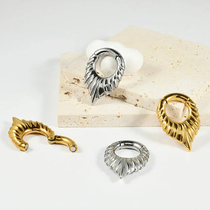 Drop-shaped stainless steel ear extender with round hanging egg design and totem etching in four colour variations