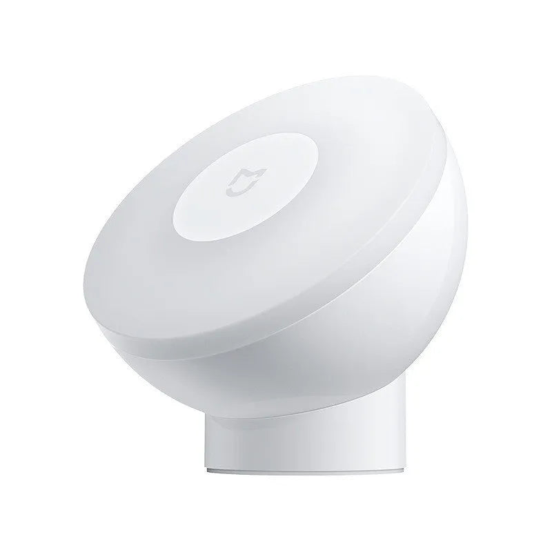White modern bedside table lamp with human body sensor and Bluetooth connectivity, dimensions 94mm by 94mm by 71mm.