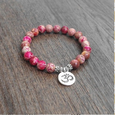 Handmade Matte Amazonite Beaded Charm Bracelet with OM Lotus charm for spiritual and fashion purposes