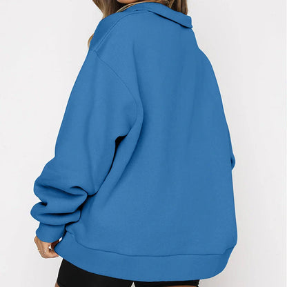 Women's zip turndown collar sweatshirt in various colors, showcasing loose fit and zipper detail.