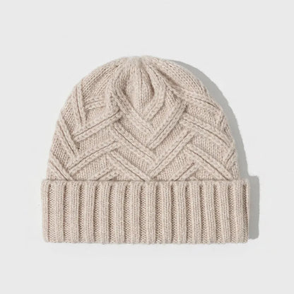 Wool knitted women's hat with dome crown in ankela red colour showing totem pattern details