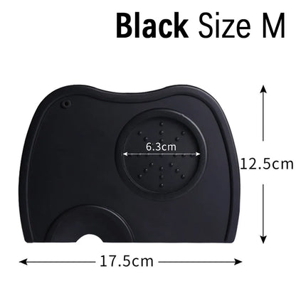 Stainless steel coffee tamper with silicone distribution pad in black or red, showing aluminium handle.