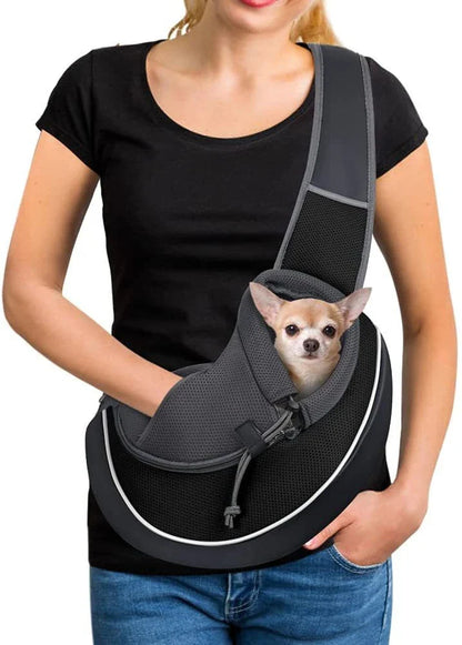 A stylish and secure crossbody bag designed to carry pets comfortably on the go, featuring adjustable drawstring closure and bottom zipper for easy access.