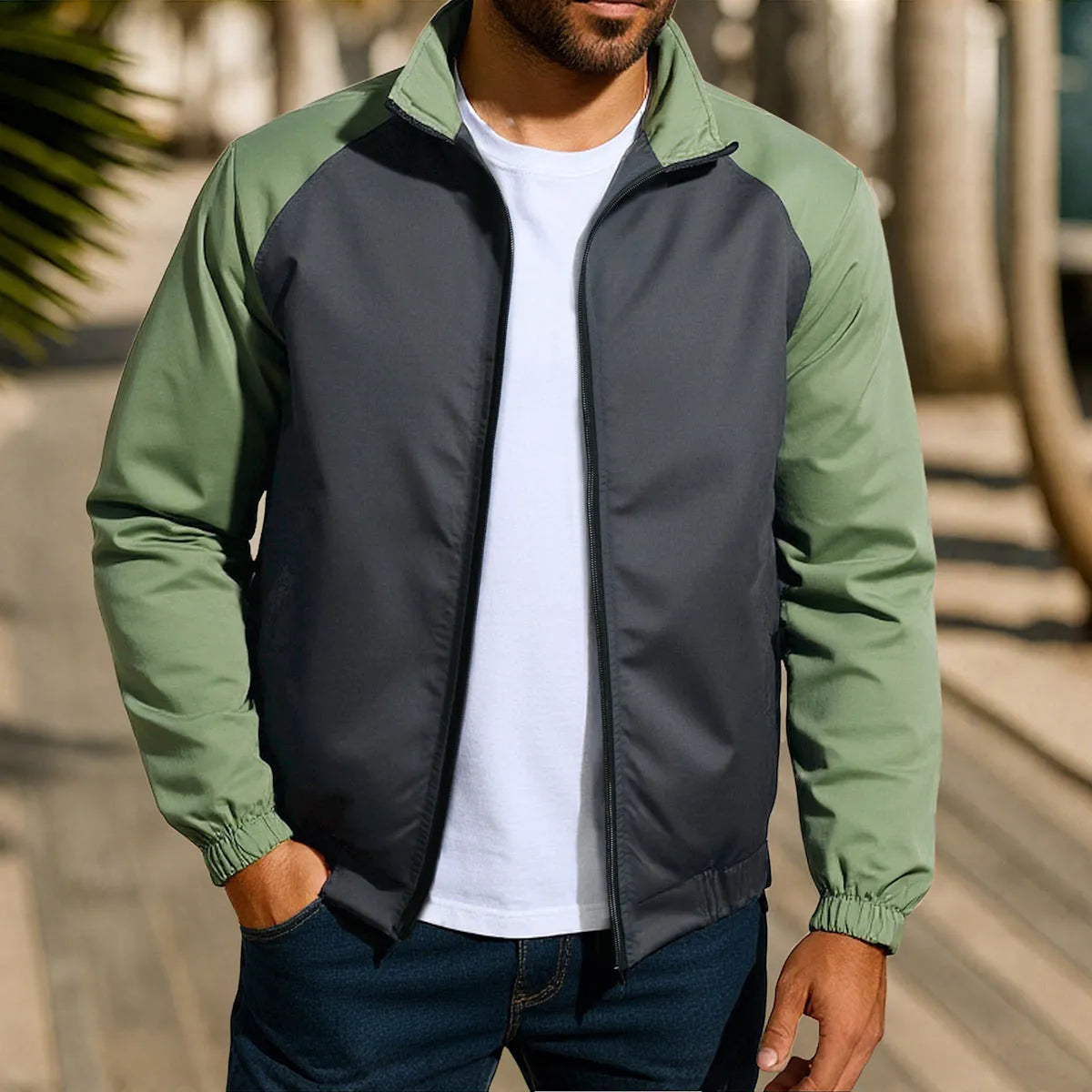 Men's red stand collar casual jacket with raglan sleeves on a hanger.