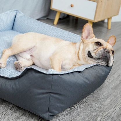 Soft grey dog bed with removable cover showing sizes for small, medium, and large pets