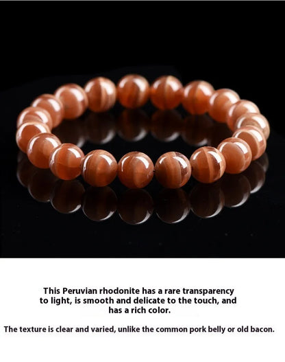 Natural old mine rhodochrosite bracelet with round geometric beads showing manganese spar colour variations
