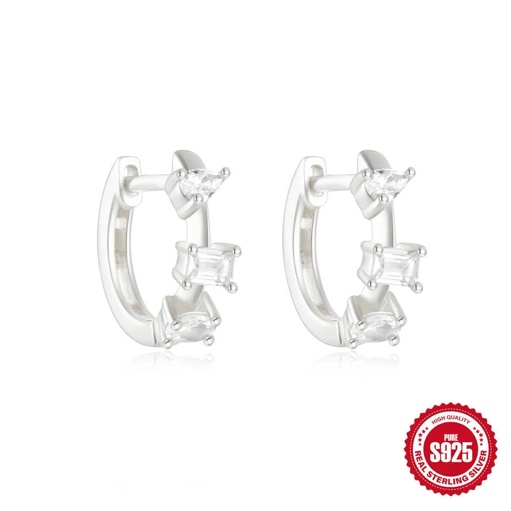 Sterling silver geometric stud earrings with small round diamond accents in gold or silver finish