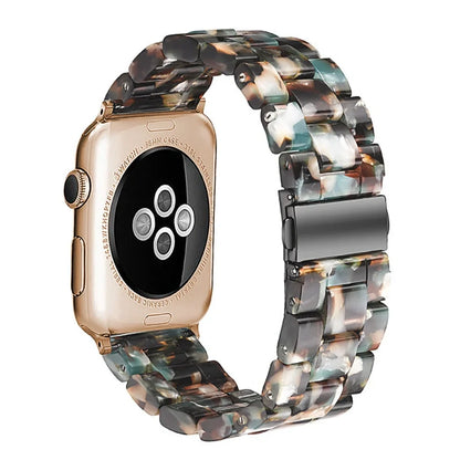 Slim resin Apple Watch strap showing attachment mechanism and colour options