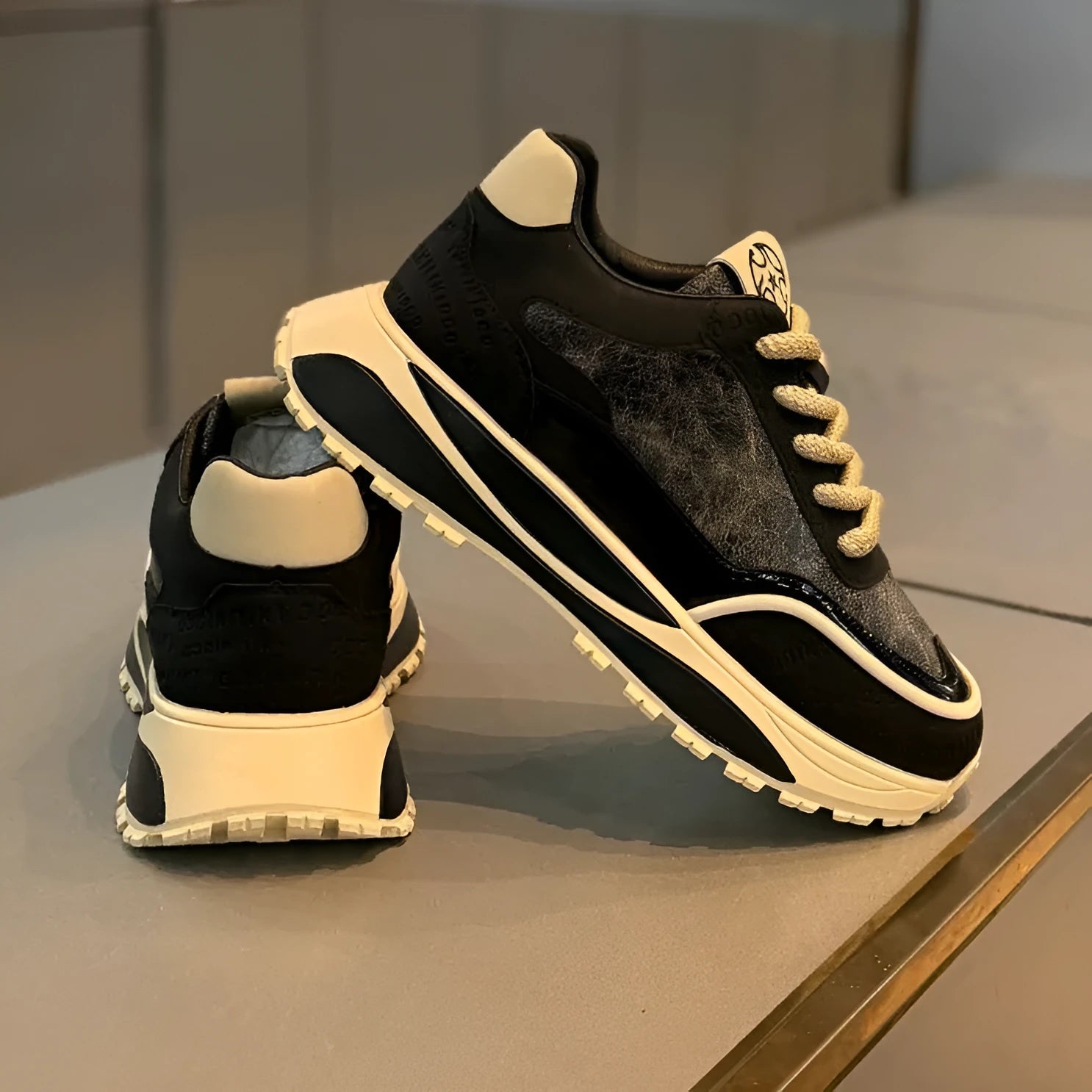 Men's black thick-sole retro lace-up casual shoes on a white background.