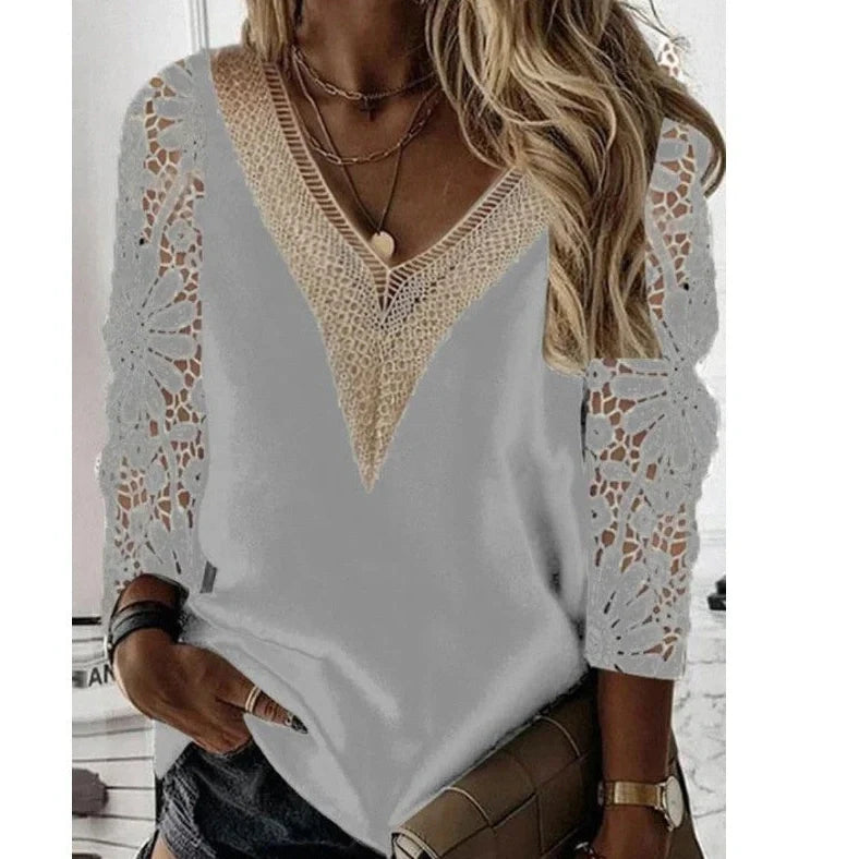 Black lace commuter shirt with nine-quarter sleeves and V-neck stitching on hanger