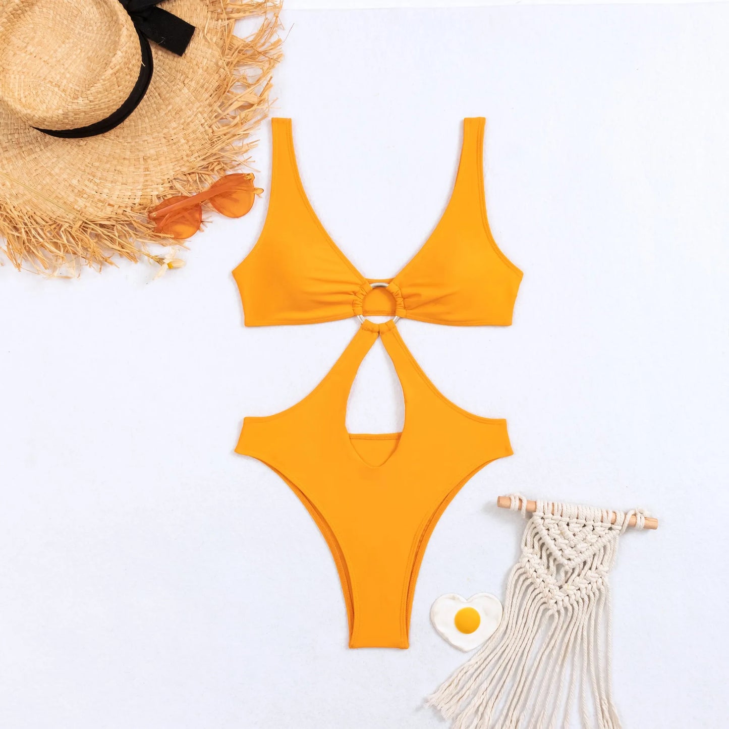 Black triangle one-piece swimsuit for women on a mannequin, sleeveless design.