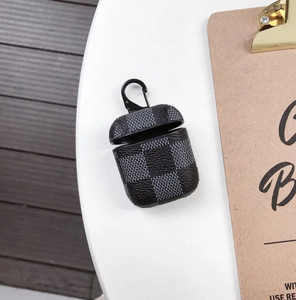 iPhone XS Max protective case with lattice pattern, headset storage slot, and a silver anti-lost hook.