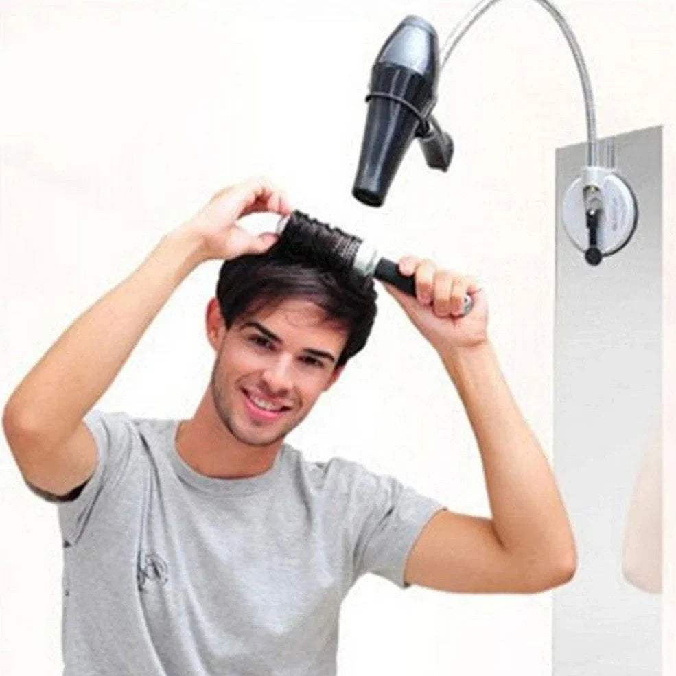 Stainless steel hair dryer holder with suction cup base showing 360-degree rotation capability